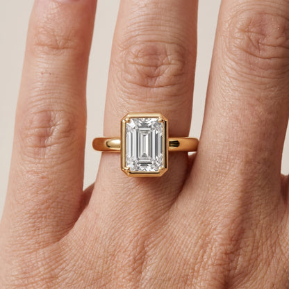 Alina Bezel Solitaire Emerald Diamond Ring in Yellow Gold - lifestyle.jpg
