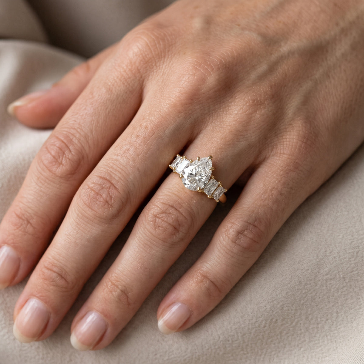 Desiree Graduated Five-Stone Pear Diamond Engagement Ring in White Gold - lifestyle.jpg