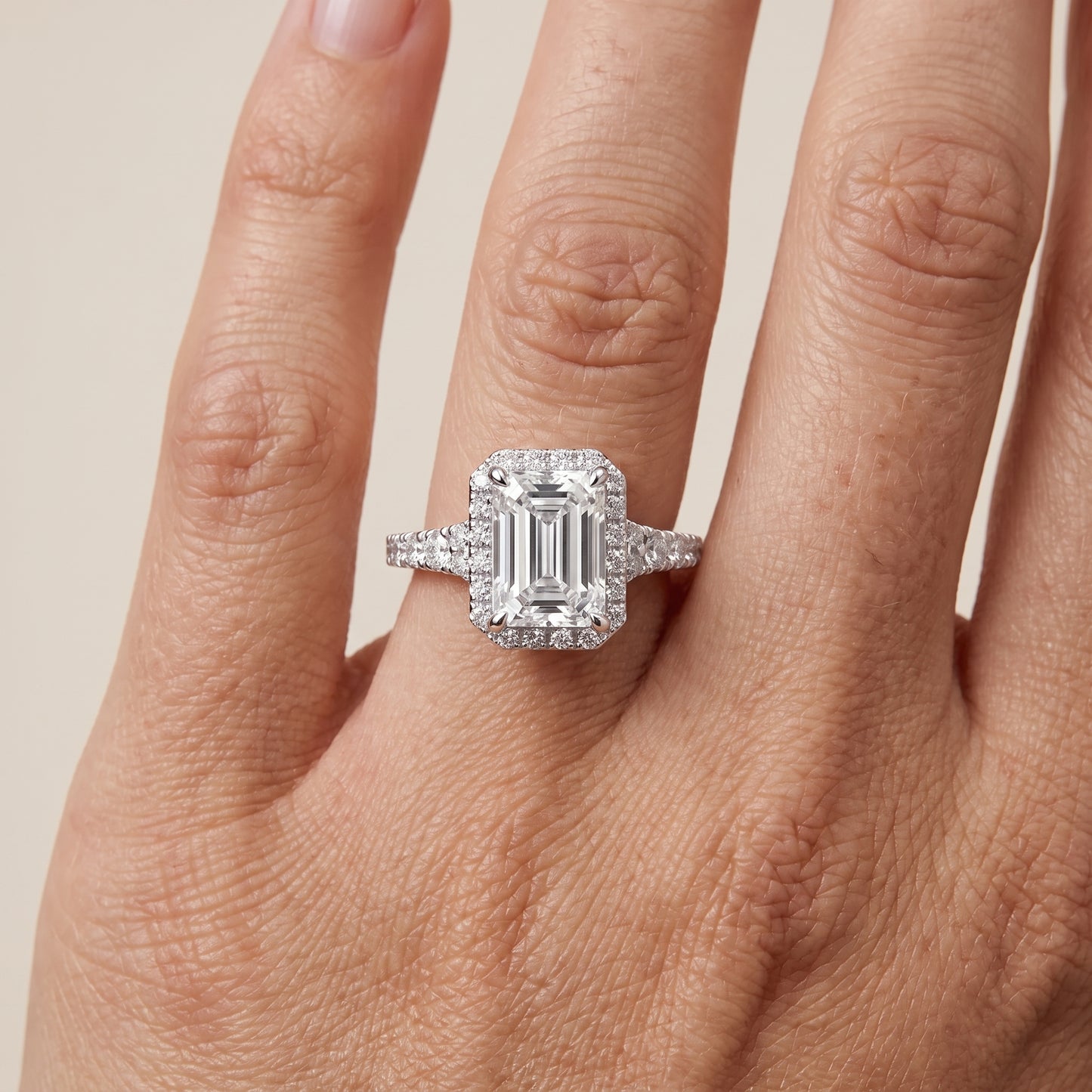 Bella Halo Pavé Emerald Diamond Engagement Ring in Silver - lifestyle.jpg