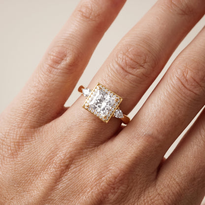 Eliza Halo Sidestone Princess Diamond Engagement Ring in Yellow Gold - lifestyle.jpg