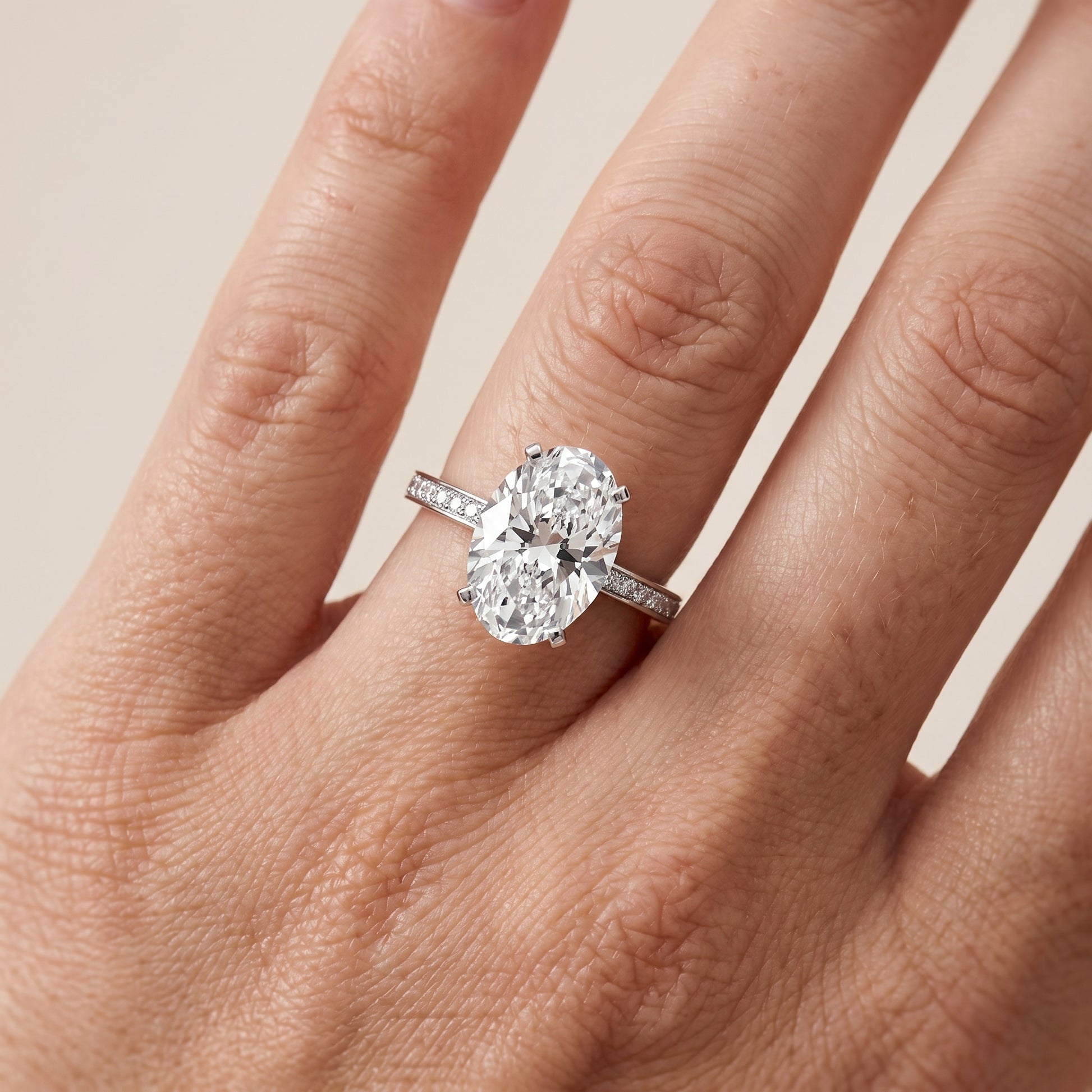 Naia Hidden Halo Oval Diamond Ring in Platinum - lifestyle.jpg