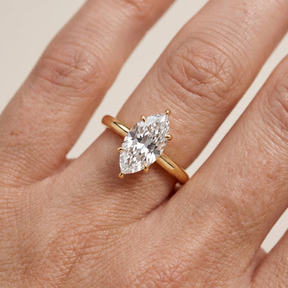 Kalia Knife Edge Solitaire Marquise Diamond Engagement Ring in Yellow Gold - lifestyle.jpg