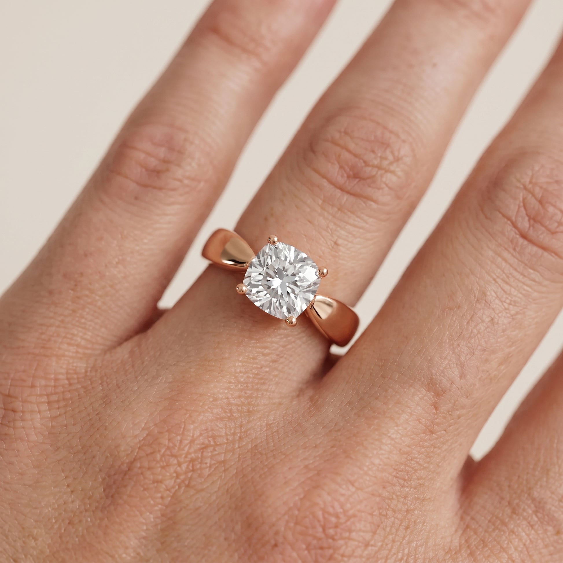 Talia Solitaire Twist Cushion Diamond Engagement Ring in Rose Gold - lifestyle.jpg