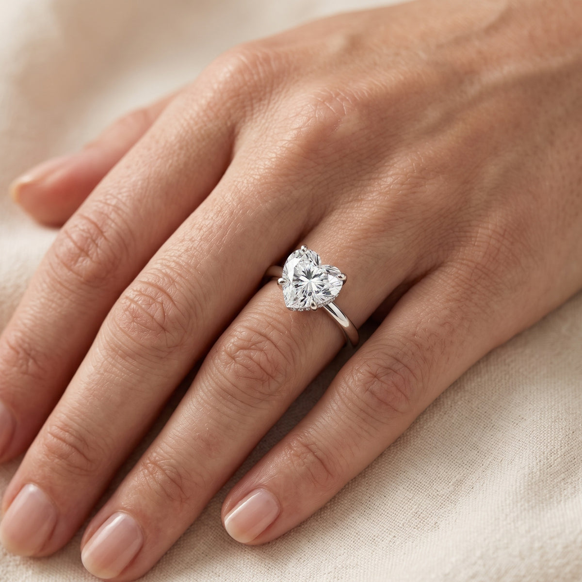 Charlotte Charm Solitaire Heart Diamond Engagement Ring in Platinum - lifestyle.jpg