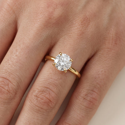 Nella Petite Solitaire Round Diamond Engagement Ring in Yellow Gold - lifestyle.jpg