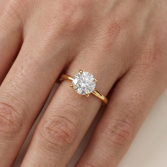 Nella Petite Solitaire Round Diamond Engagement Ring in Yellow Gold - lifestyle.jpg