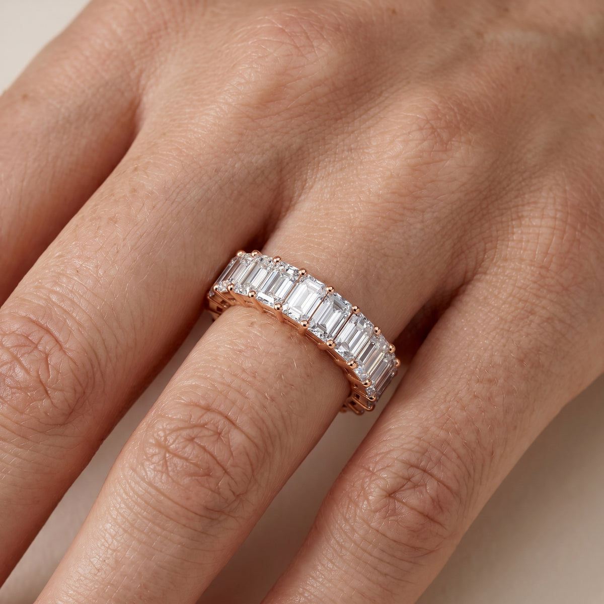 Adelaide Shared Prong Emerald Diamond Eternity Band in Rose Gold - lifestyle.jpg