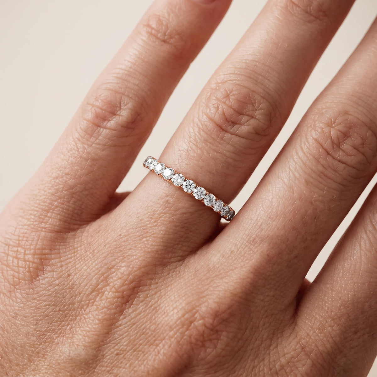 Jaya French Pavé Round Diamond Half Eternity Band in Rose Gold - lifestyle.jpg