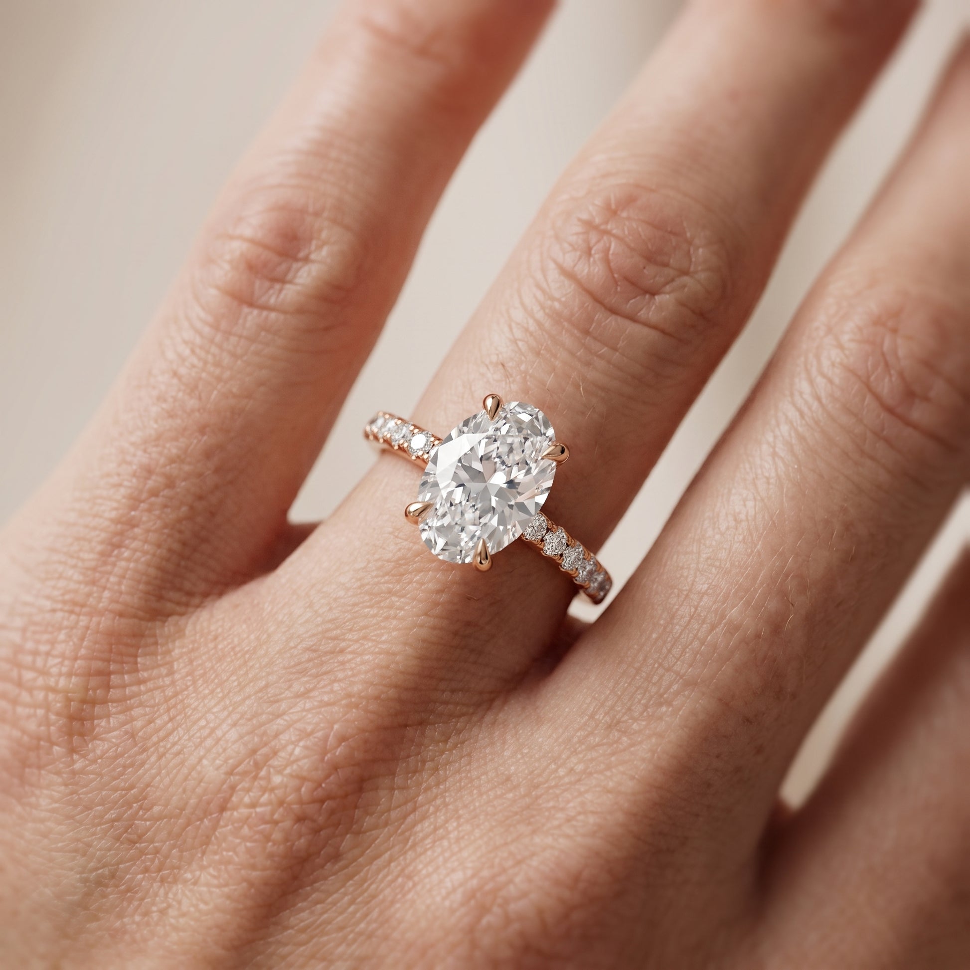 Maya Hidden Halo Pavé Oval Diamond Engagement Ring in Rose Gold - lifestyle.jpg