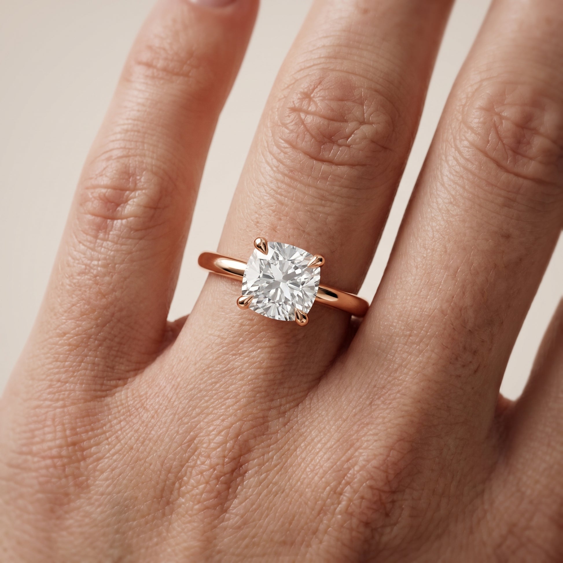 Nella Petite Solitaire Cushion Diamond Engagement Ring in Rose Gold - lifestyle.jpg