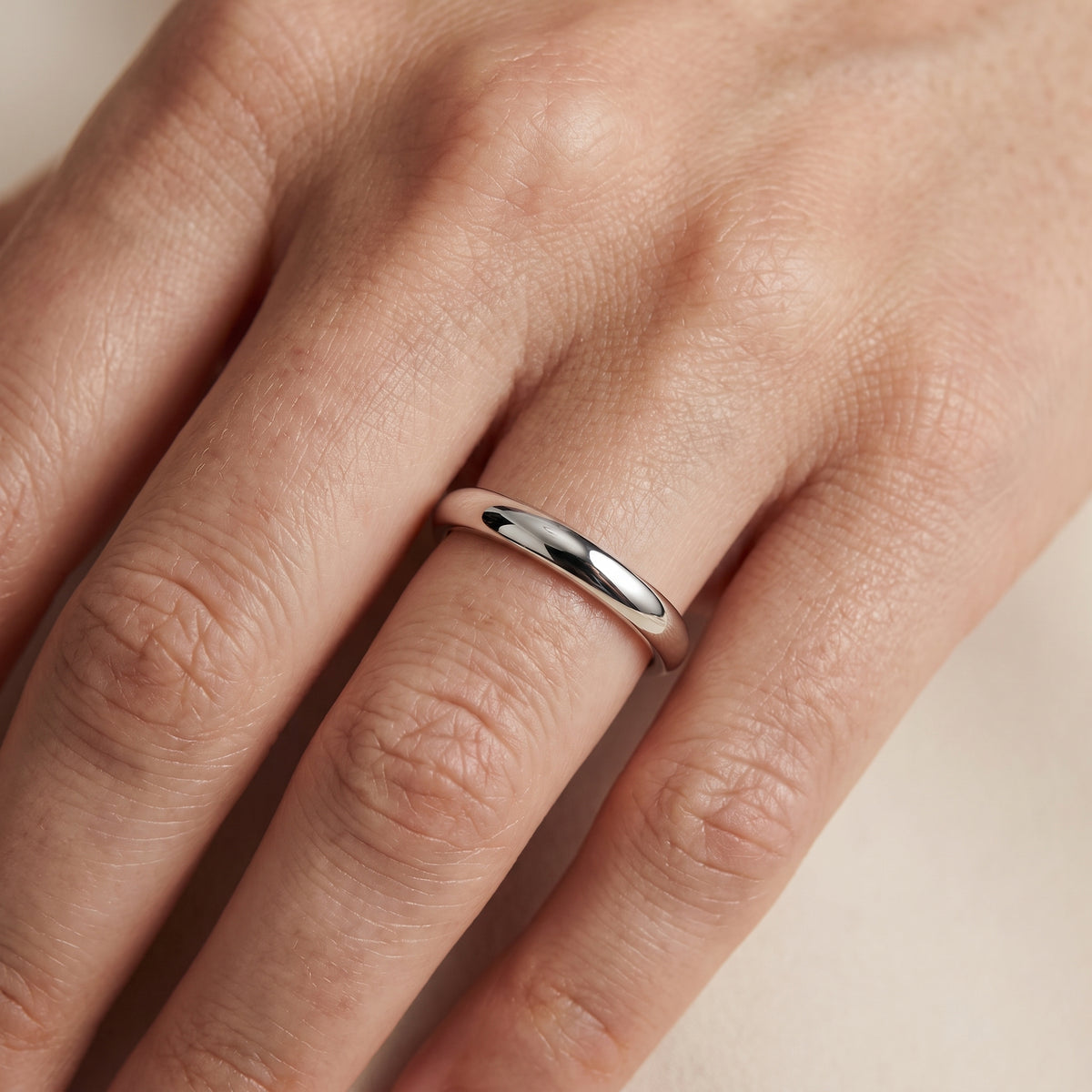 Justine Classic Low Dome Wedding Band in White Gold - lifestyle.jpg