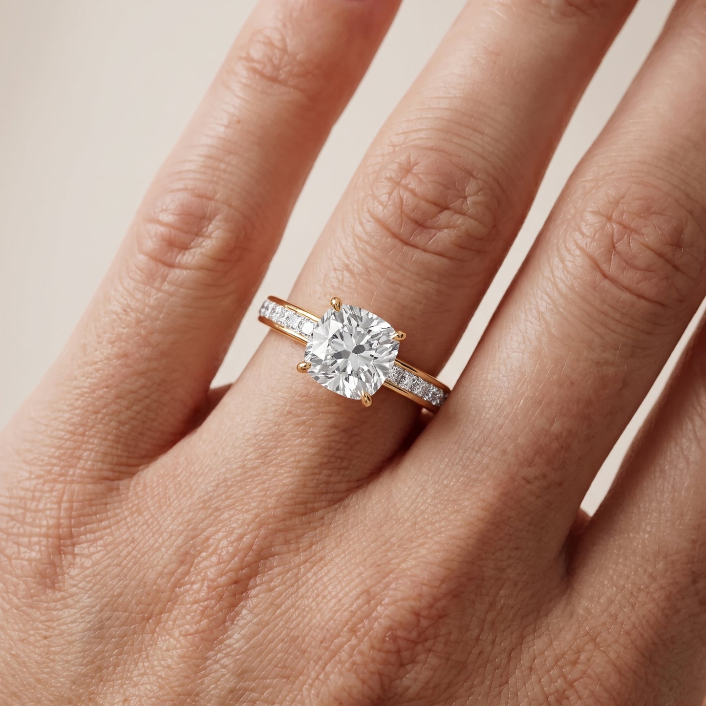 Brielle Channel Set Solitaire Cushion Diamond Ring in Yellow Gold - lifestyle.jpg