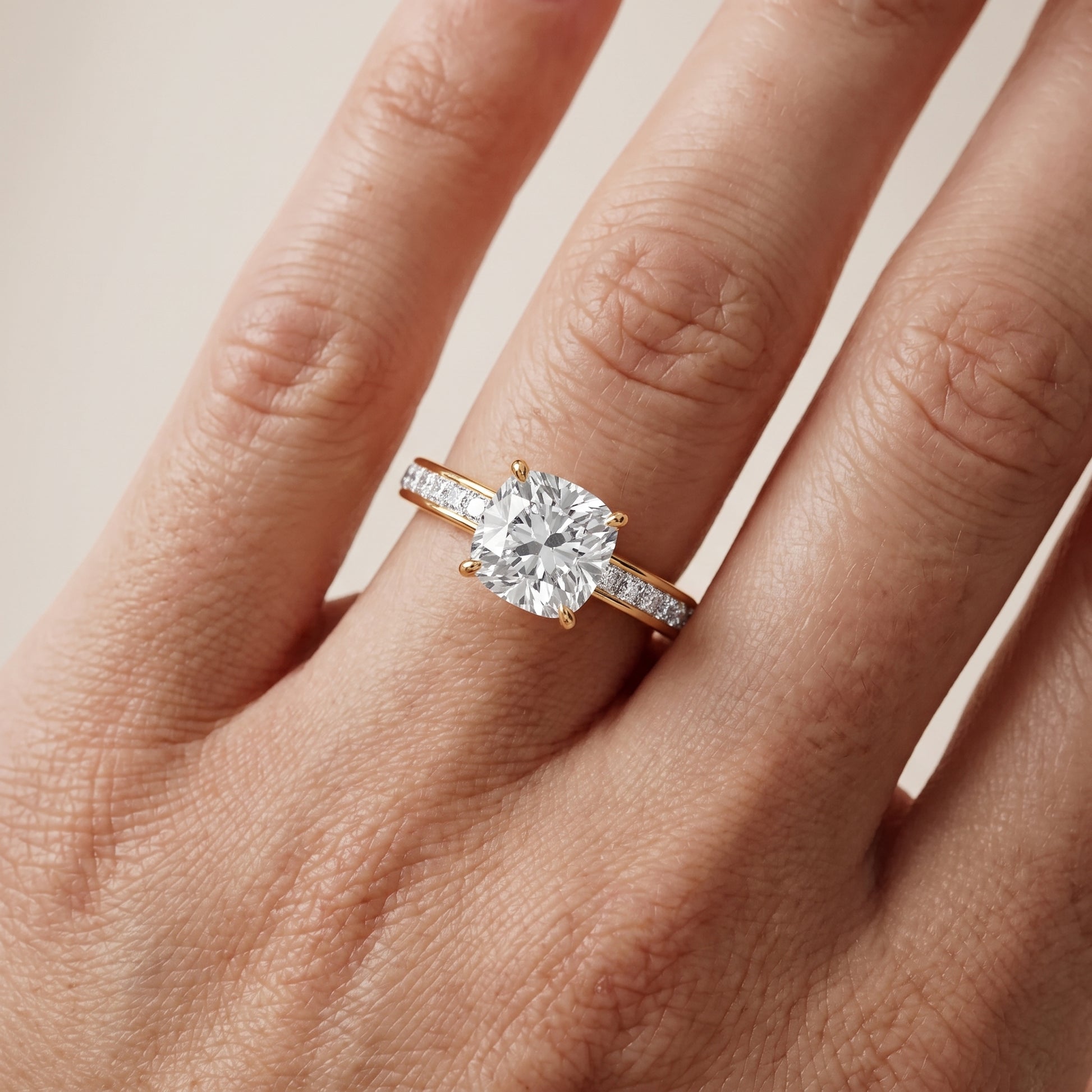 Brielle Channel Set Solitaire Cushion Diamond Ring in Yellow Gold - lifestyle.jpg