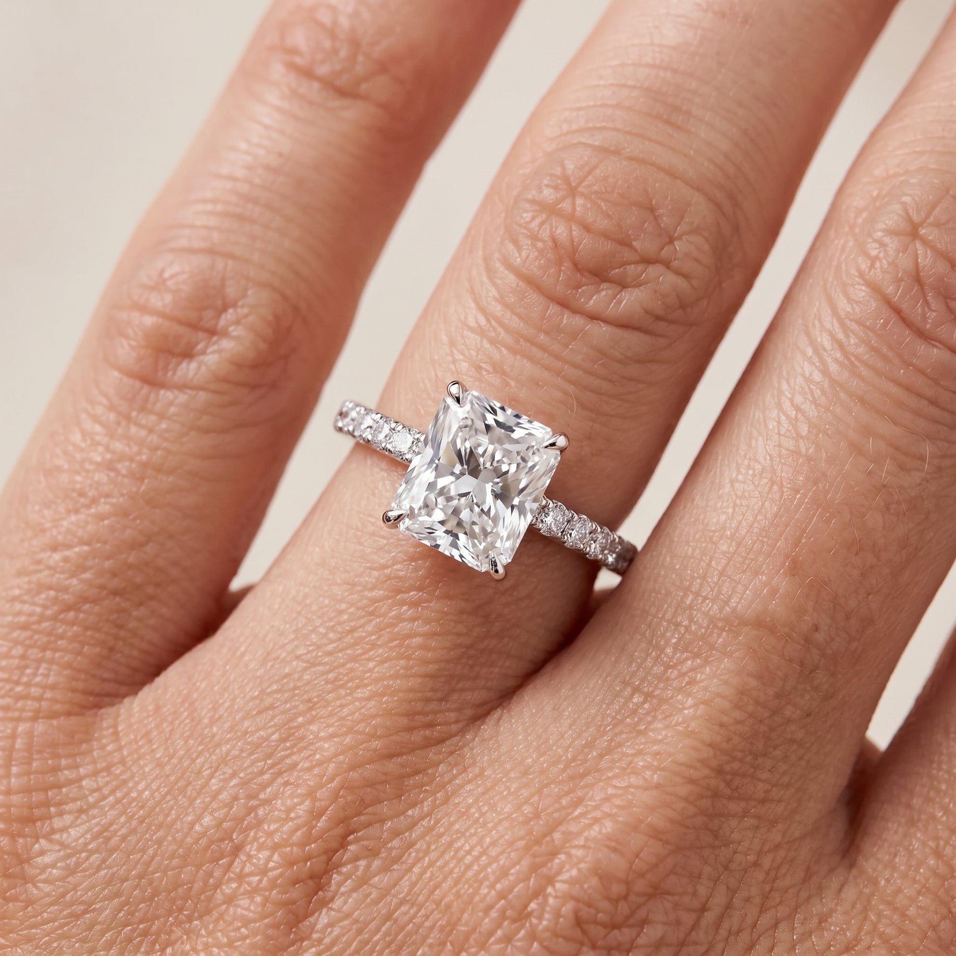 Juna French Pavé Solitaire Radiant Diamond Engagement Ring in Platinum - lifestyle.jpg
