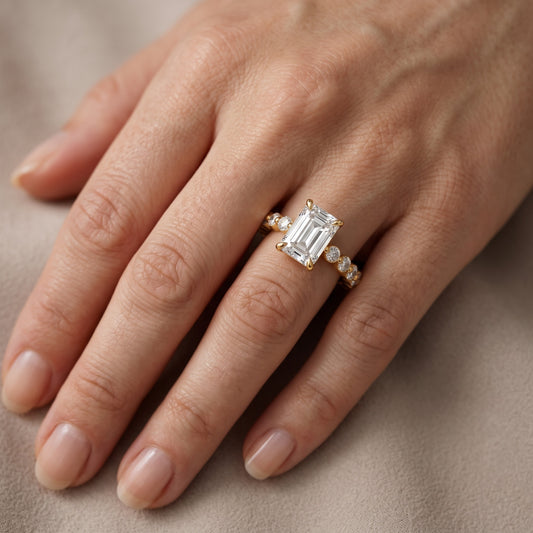 Piper Sidestone Emerald Diamond Engagement Ring in Yellow Gold - lifestyle.jpg