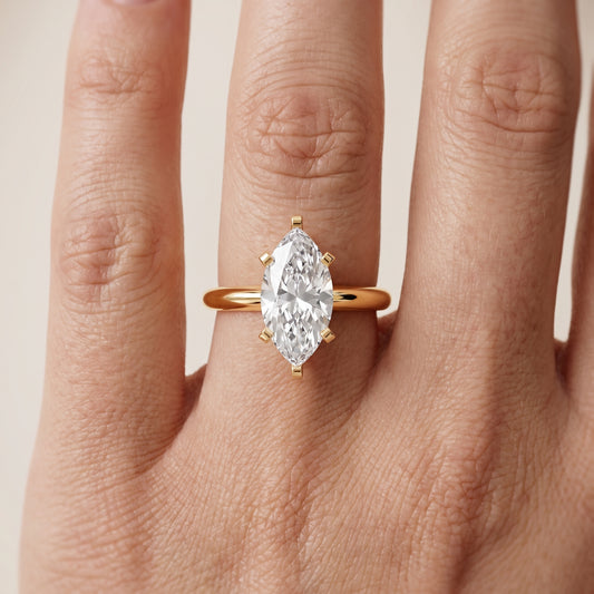 Amira Six-Prong Solitaire Marquise Diamond Engagement Ring in Yellow Gold - lifestyle.jpg