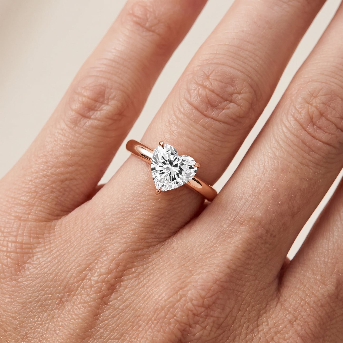 Evie Solitaire Six-Prong Heart Diamond Engagement Ring in Rose Gold - lifestyle.jpg