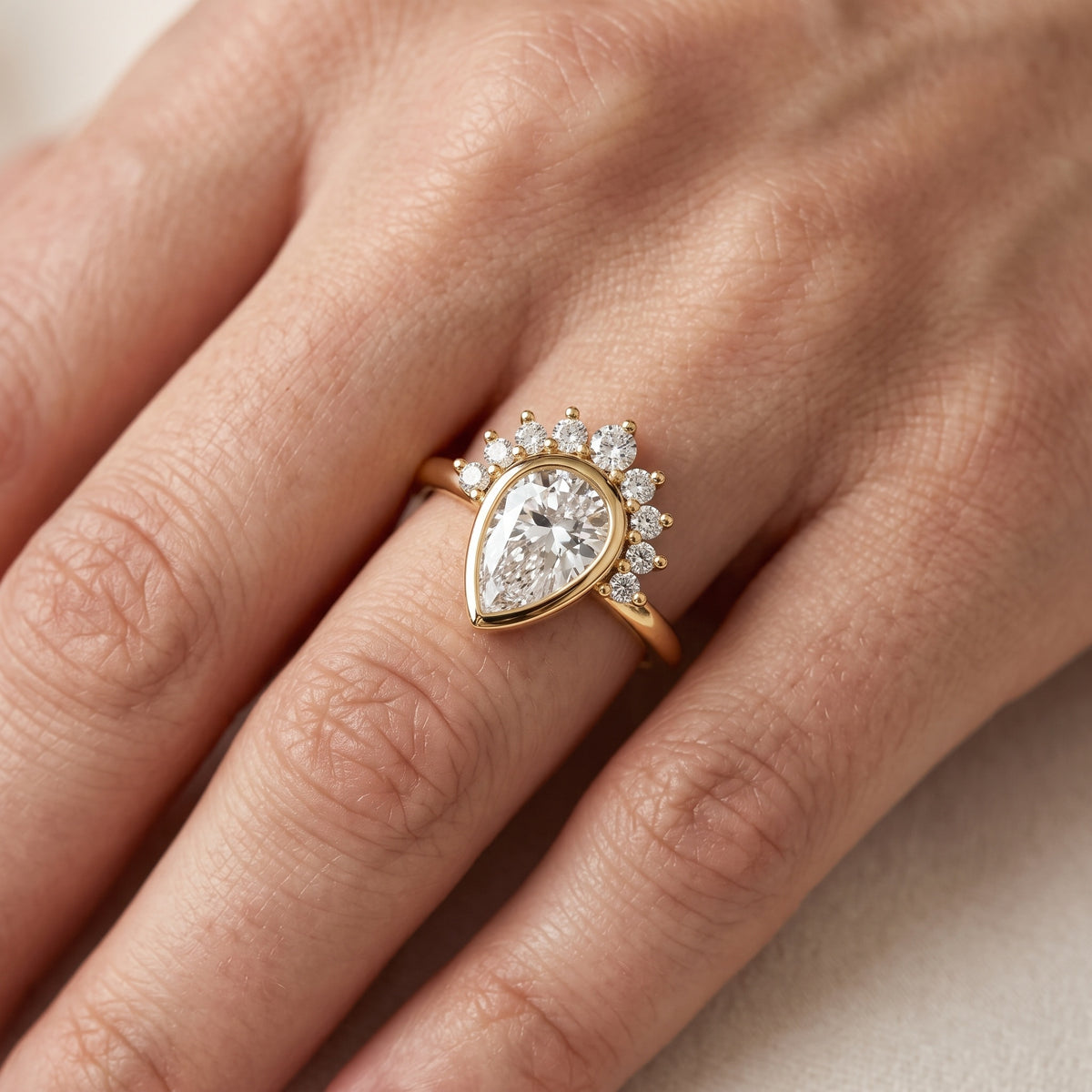 Dora Bezel Halo Pear Diamond Engagement Ring in Rose Gold - lifestyle.jpg