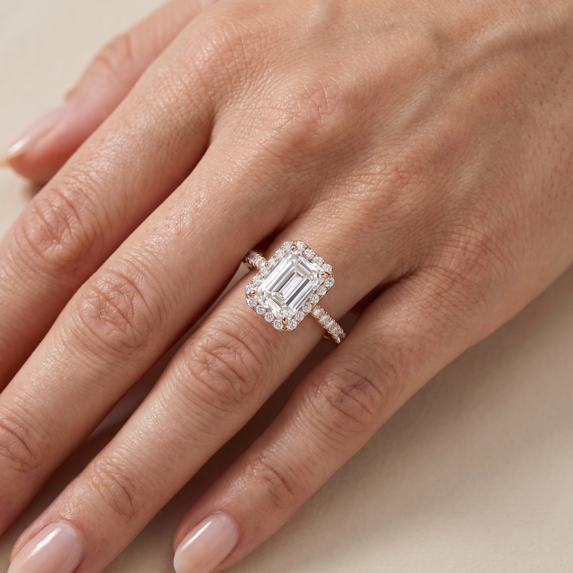 Willa Halo Micropavé Emerald Diamond Engagement Ring in Rose Gold - lifestyle.jpg