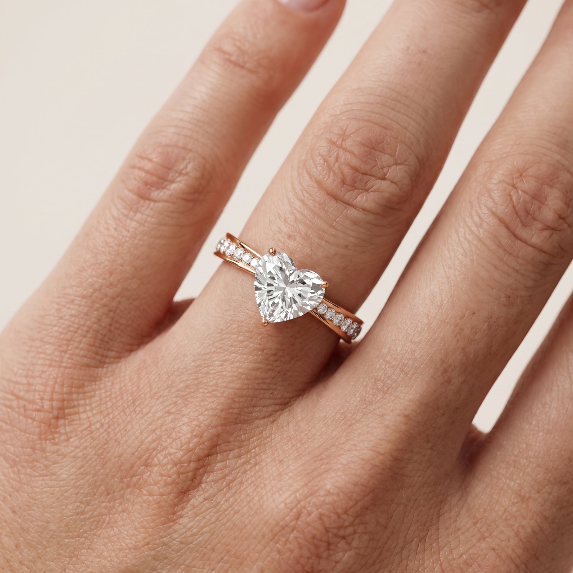 Rhea Sidestone Pavé Heart Diamond Engagement Ring in Rose Gold - lifestyle.jpg