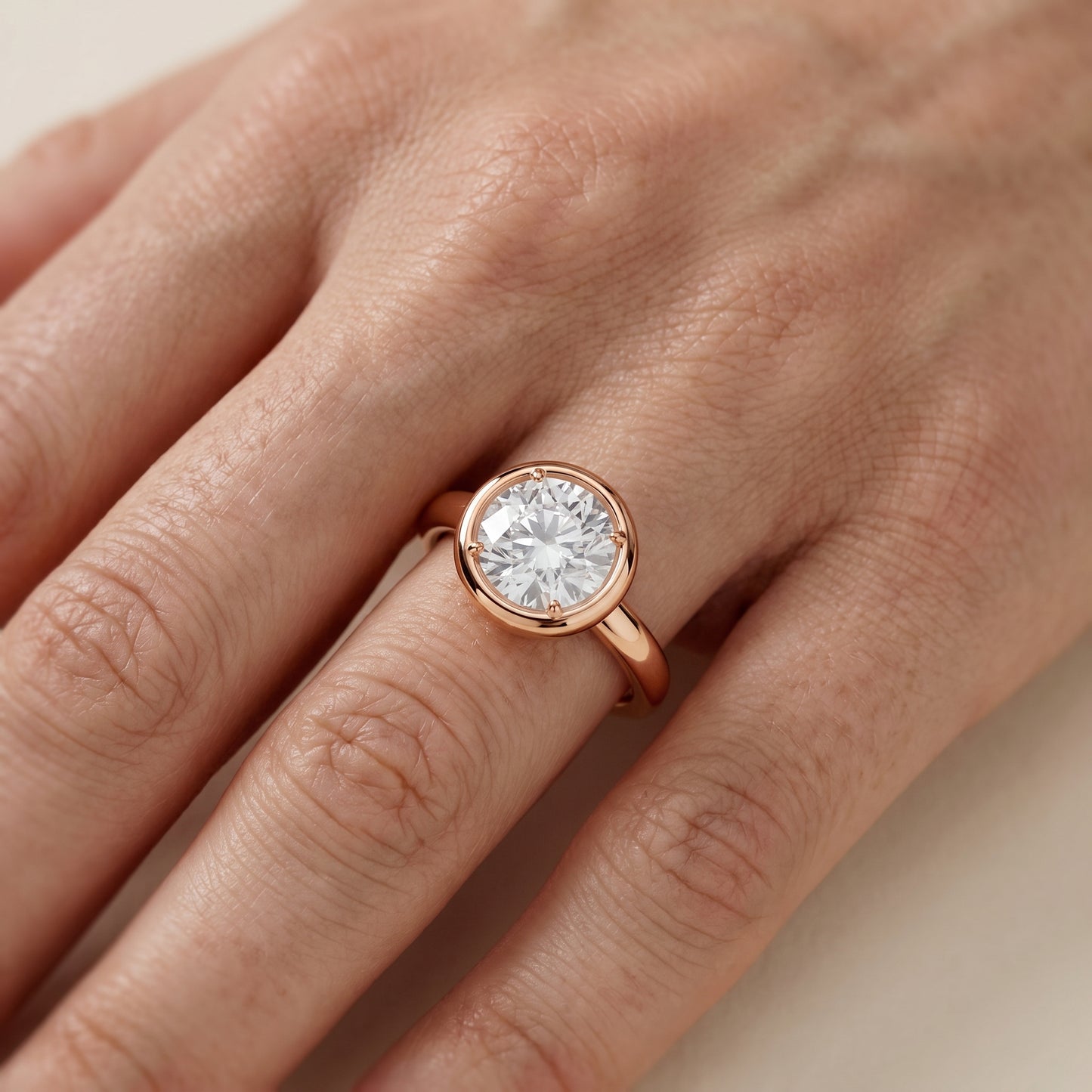 Alina Bezel Solitaire Round Diamond Ring in Rose Gold - lifestyle.jpg