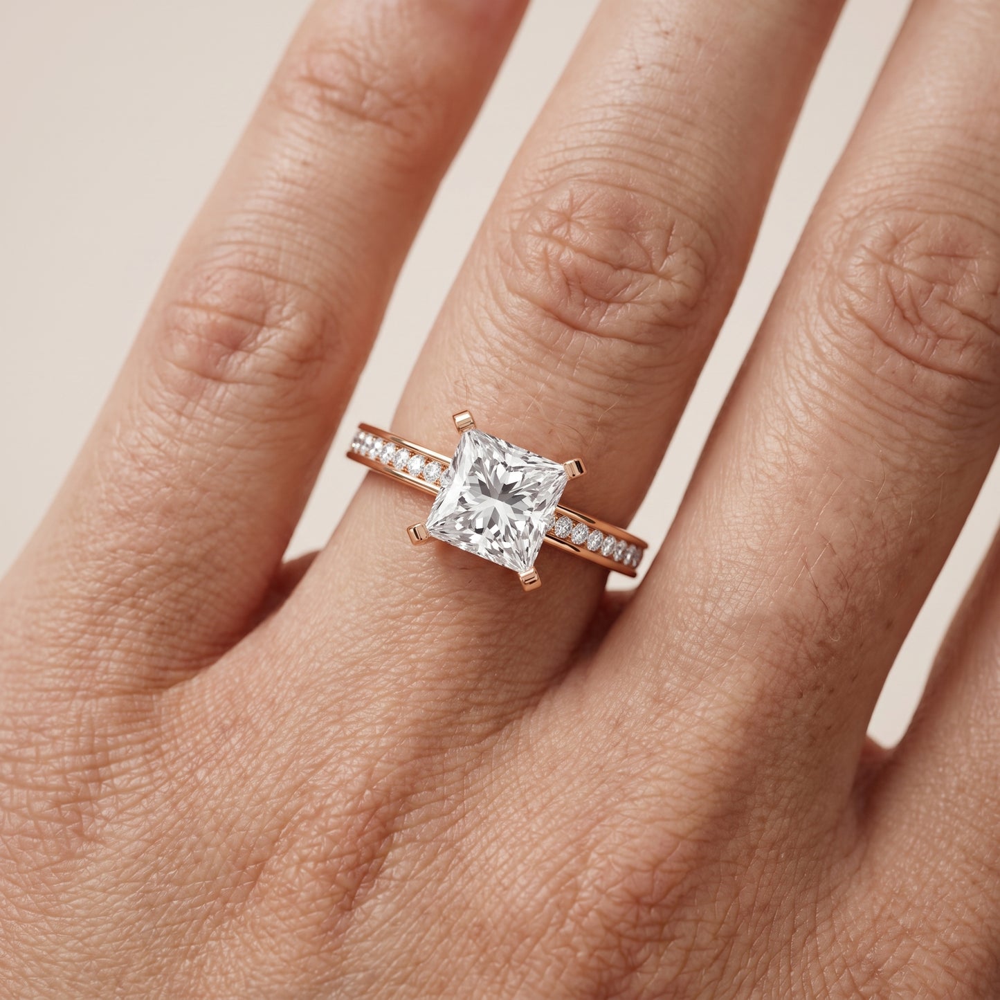 Tessa Solitaire Channel Set Princess Diamond Engagement Ring in Rose Gold - lifestyle.jpg