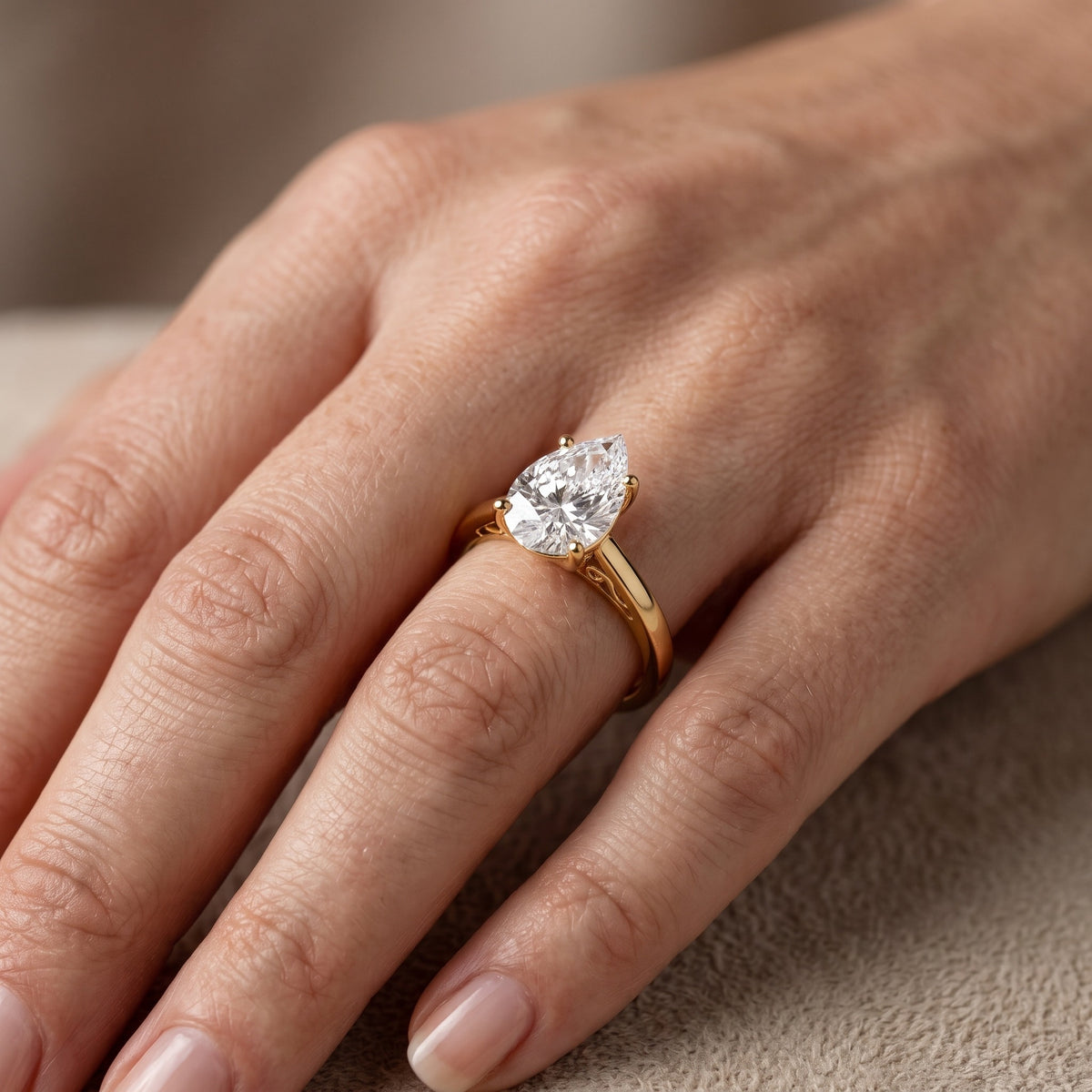 Iris Vintage Pear Diamond Engagement Ring in Yellow Gold - lifestyle.jpg