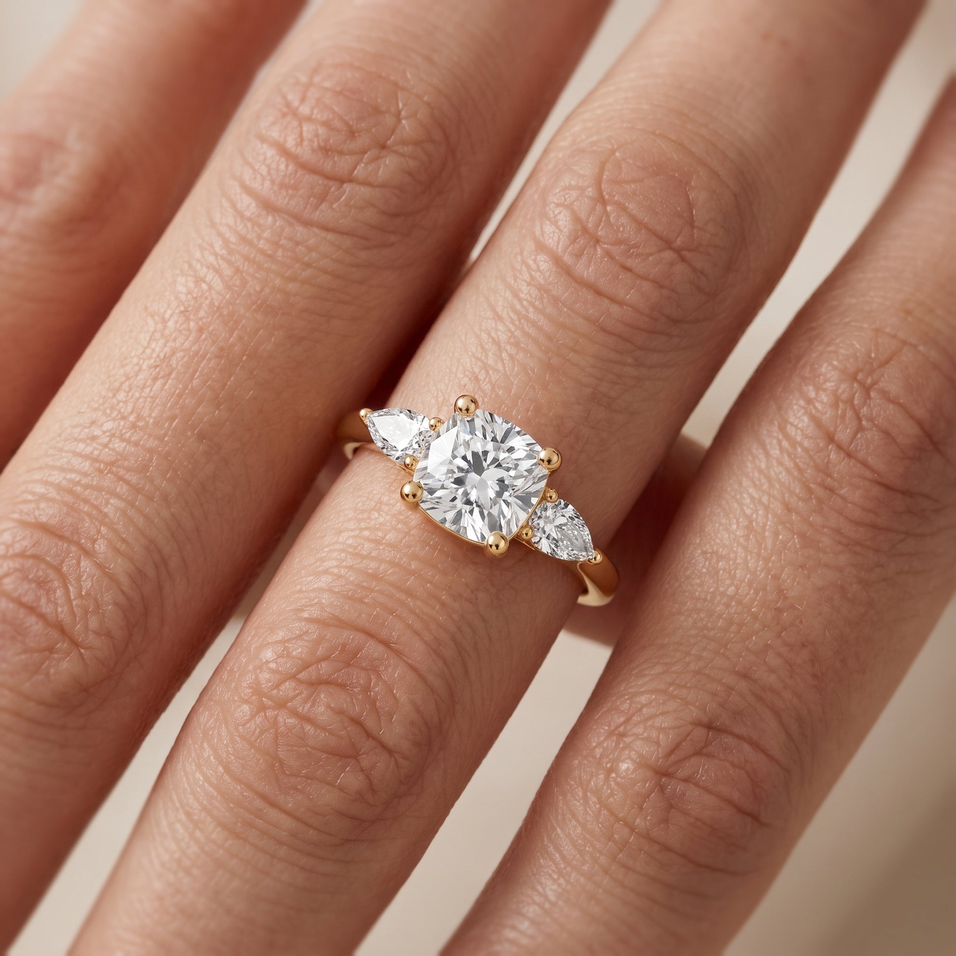 Faye Three-Stone Trellis Cushion Diamond Ring in Yellow Gold - lifestyle.jpg