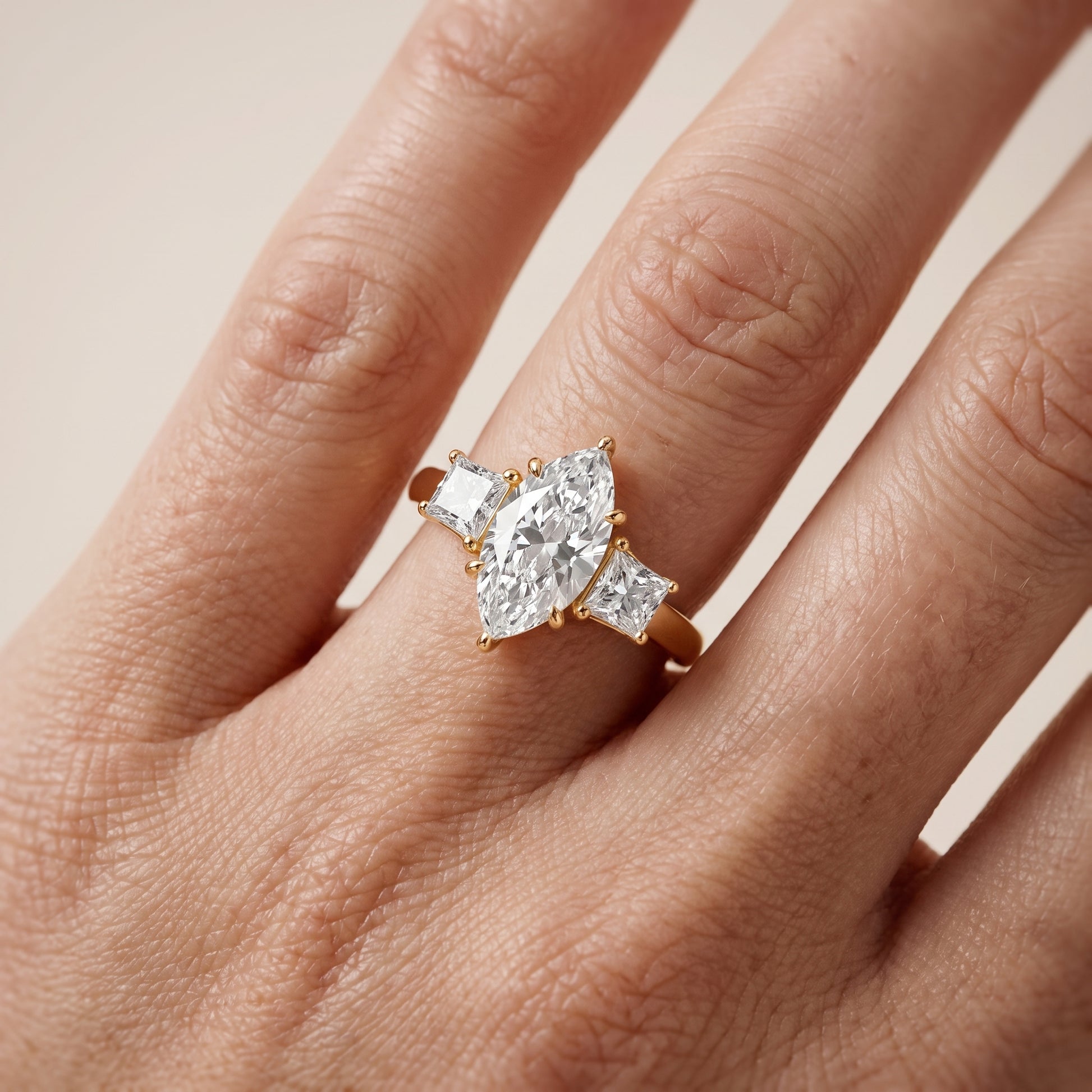 Sienna Three-Stone Marquise Diamond Ring in Yellow Gold - lifestyle.jpg
