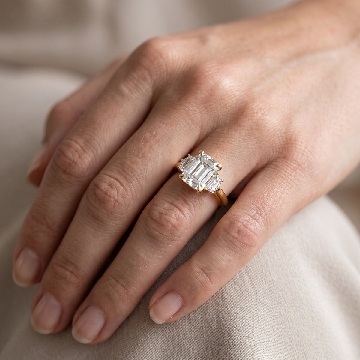 Elmira Step-Cut Three-Stone Emerald Diamond Engagement Ring in White Gold - lifestyle.jpg