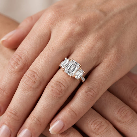 Gabrielle Three-Stone Pavé Emerald Diamond Engagement Ring in Rose Gold - lifestyle.jpg