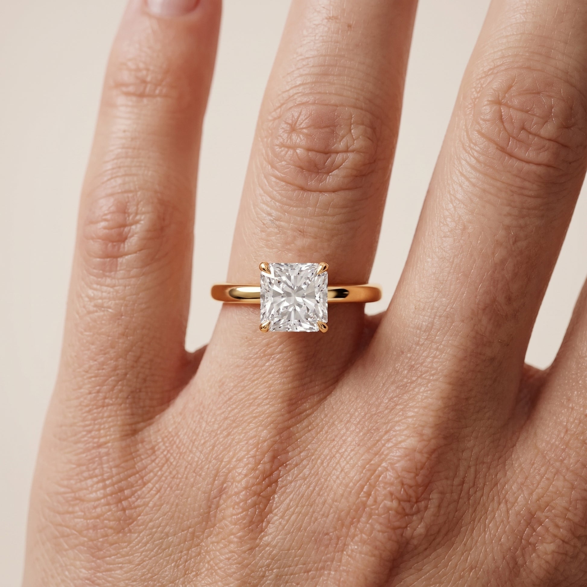 Lyla Petite Solitaire Radiant Diamond Engagement Ring in Yellow Gold - lifestyle.jpg