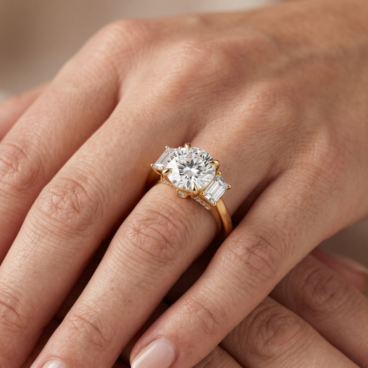 Galena Step-Cut Three-Stone Round Diamond Engagement Ring in Rose Gold - lifestyle.jpg