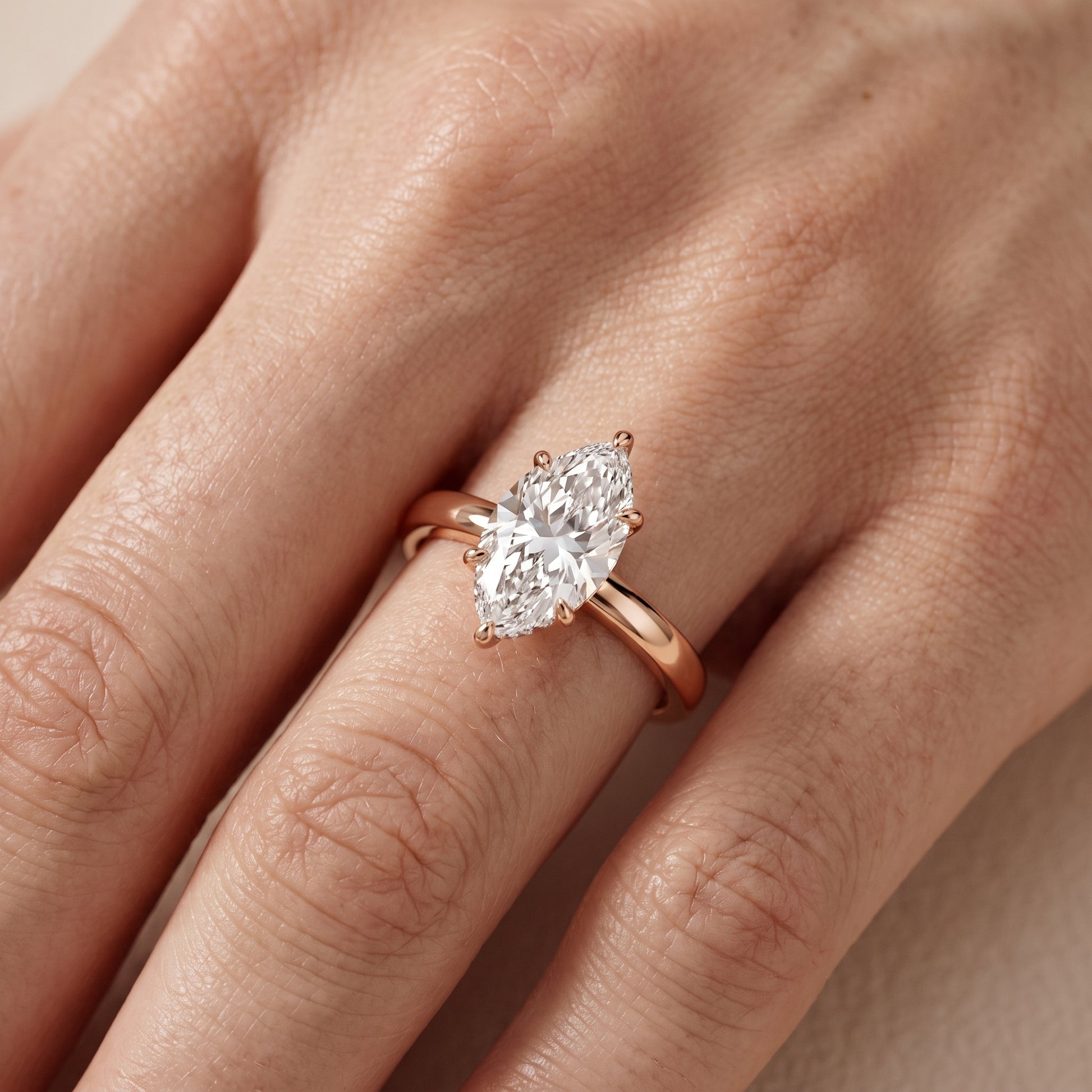 Lara Hidden Halo Marquise Diamond Engagement Ring in Rose Gold - lifestyle.jpg