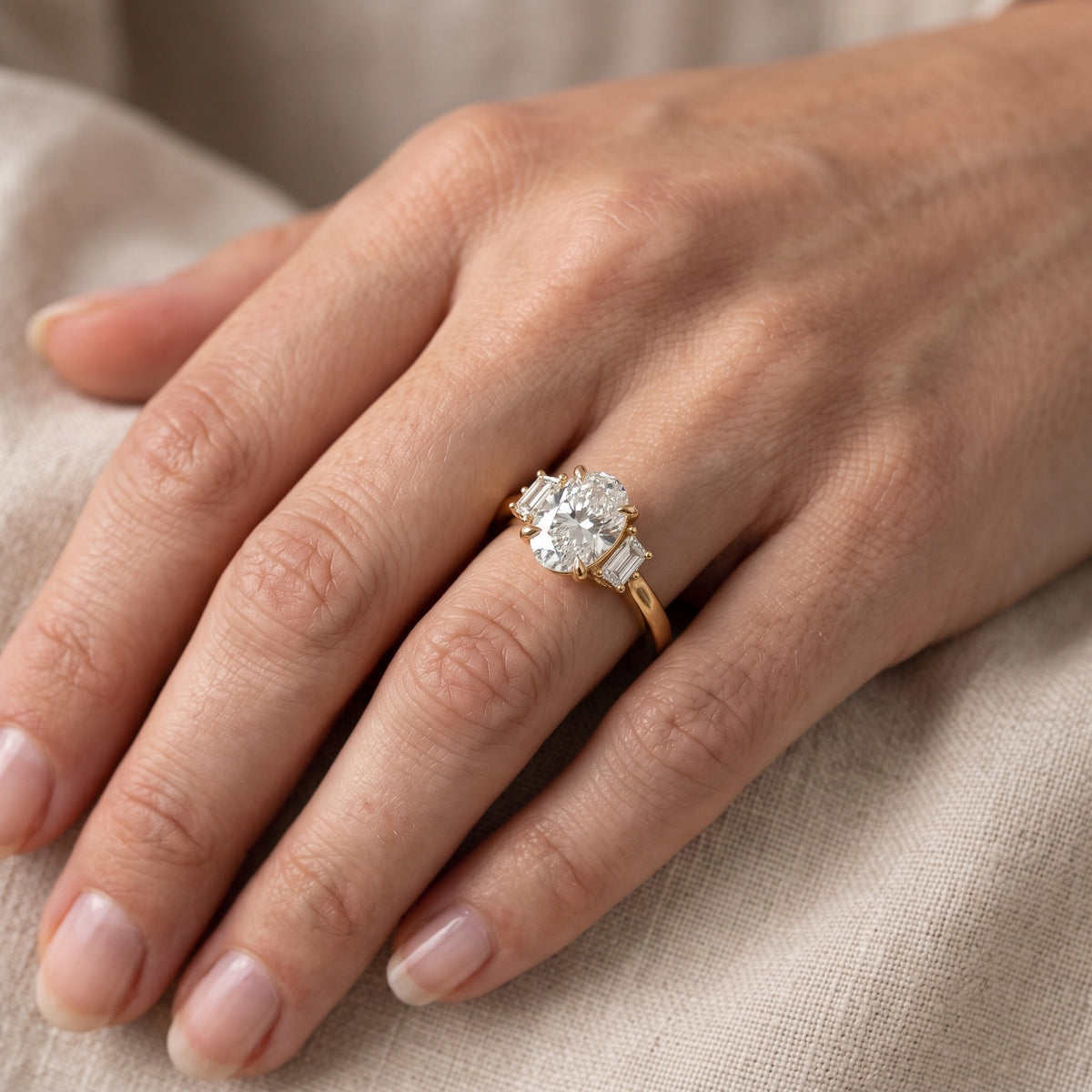 Elmira Step-Cut Three-Stone Oval Diamond Engagement Ring in Platinum - lifestyle.jpg