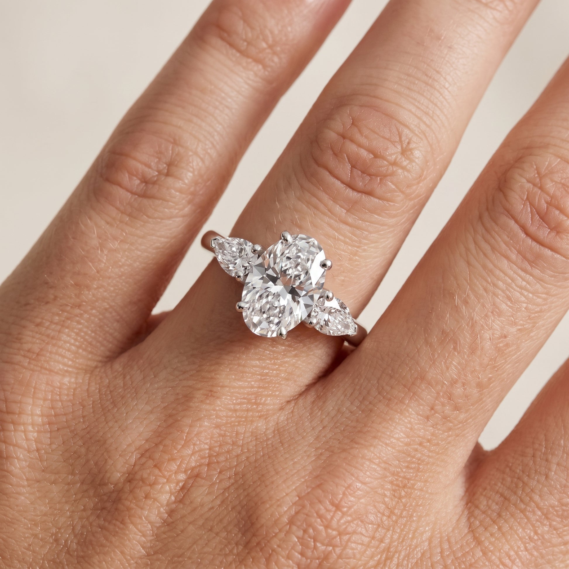Mirabel Three-Stone Oval Diamond Engagement Ring in Platinum - lifestyle.jpg