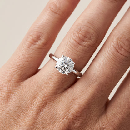 Nella Petite Solitaire Round Diamond Engagement Ring in Platinum - lifestyle.jpg
