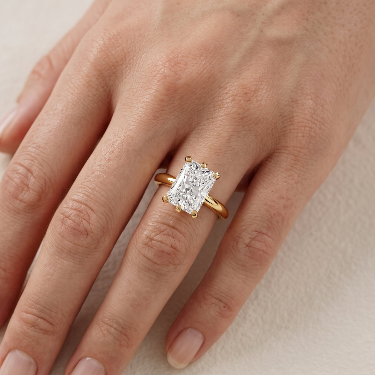 Arabella Six-Prong Solitaire Radiant Diamond Engagement Ring in Yellow Gold - lifestyle.jpg