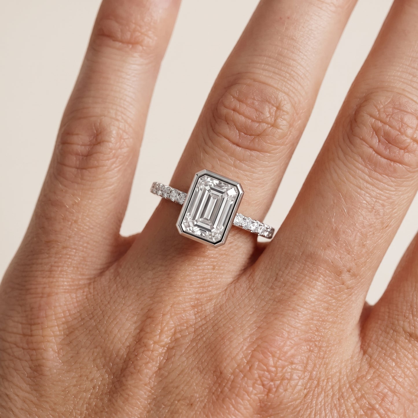 Cora Bezel Pavé Emerald Diamond Ring in Silver - lifestyle.jpg