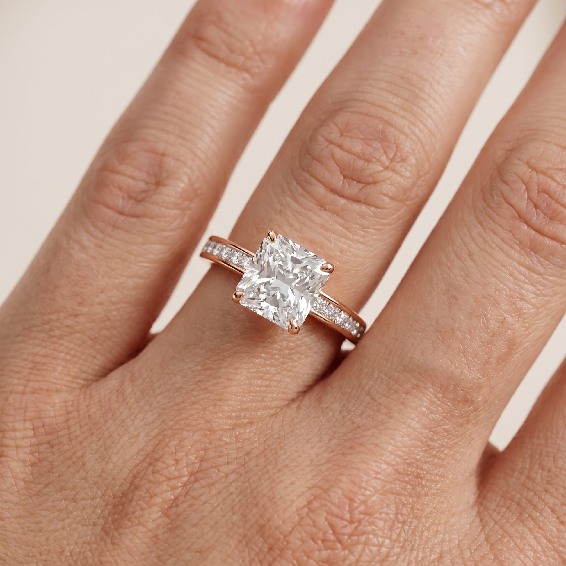 Maren Sidestone Channel Set Radiant Diamond Engagement Ring in Rose Gold - lifestyle.jpg