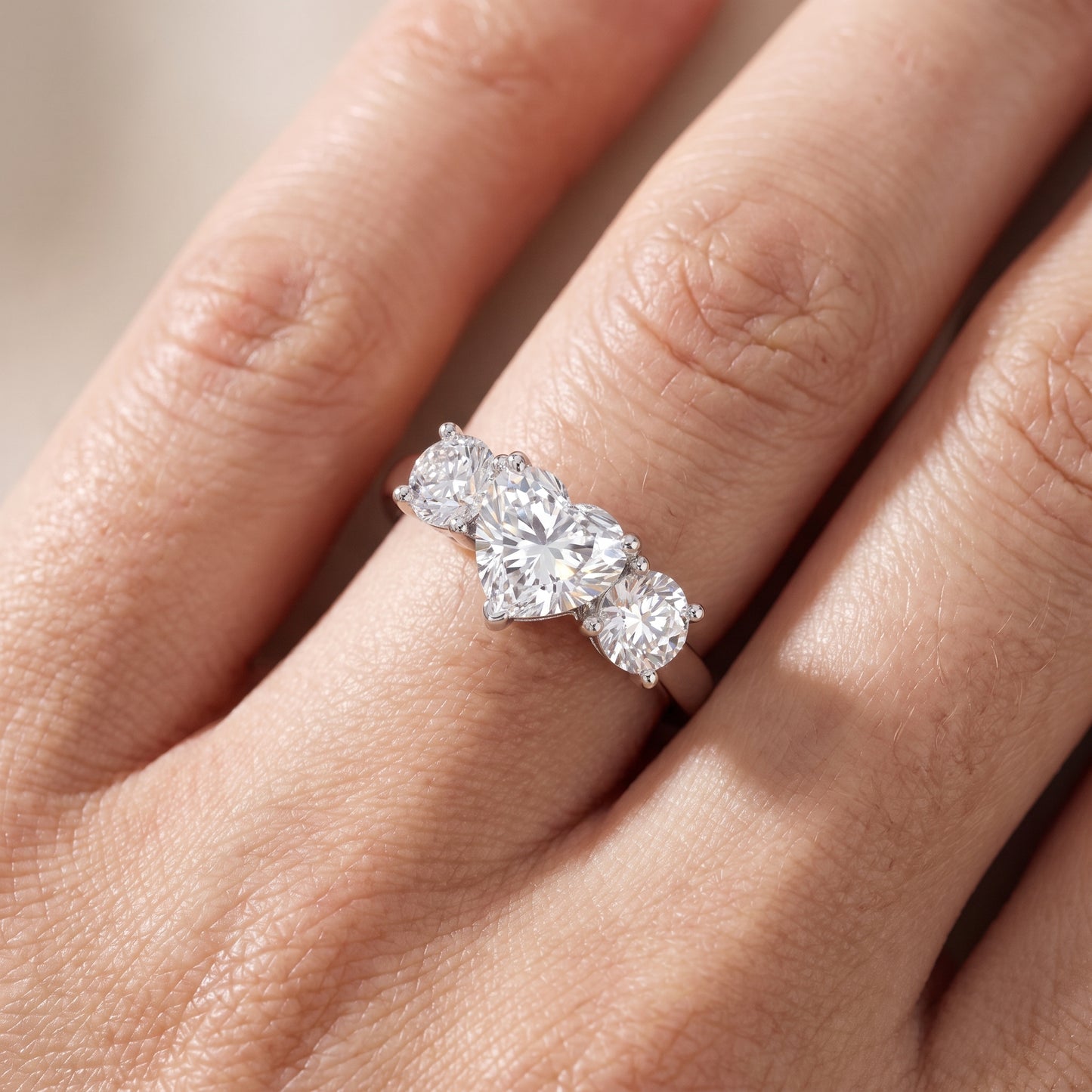 Callie Three-Stone Trellis Heart Diamond Engagement Ring in White Gold - lifestyle.jpg