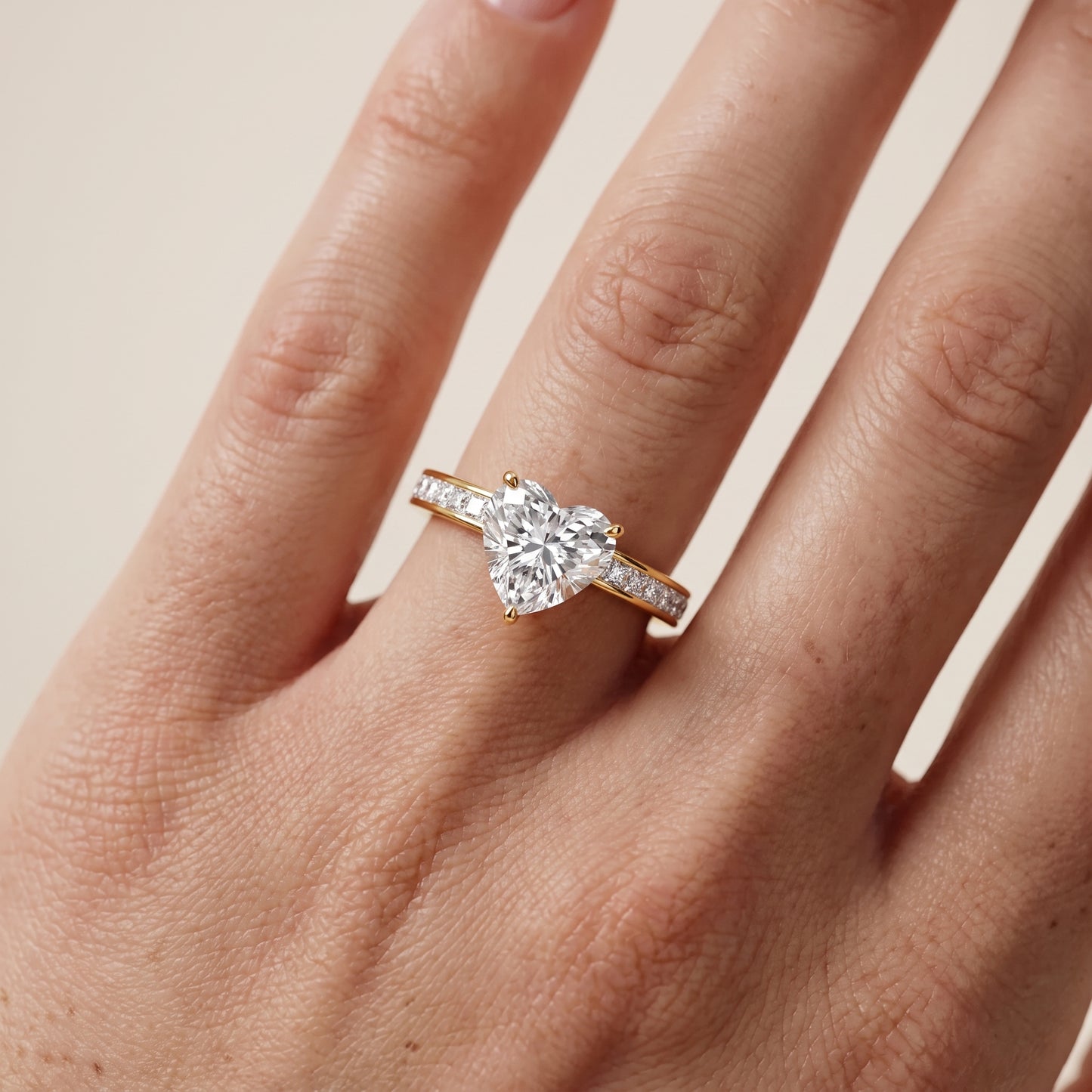 Brielle Channel Set Solitaire Heart Diamond Ring in Yellow Gold - lifestyle.jpg