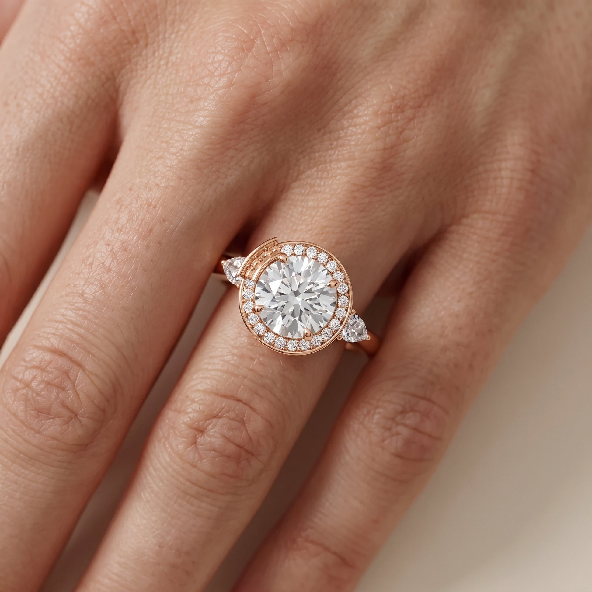 Eliza Halo Sidestone Round Diamond Engagement Ring in Rose Gold - lifestyle.jpg