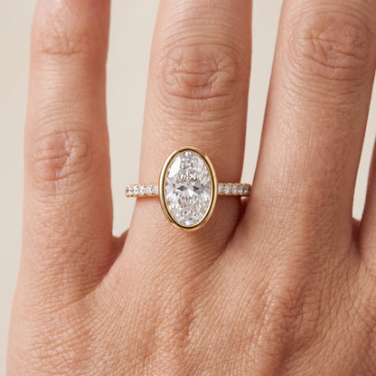 Cora Bezel Pavé Oval Diamond Ring in Yellow Gold - lifestyle.jpg