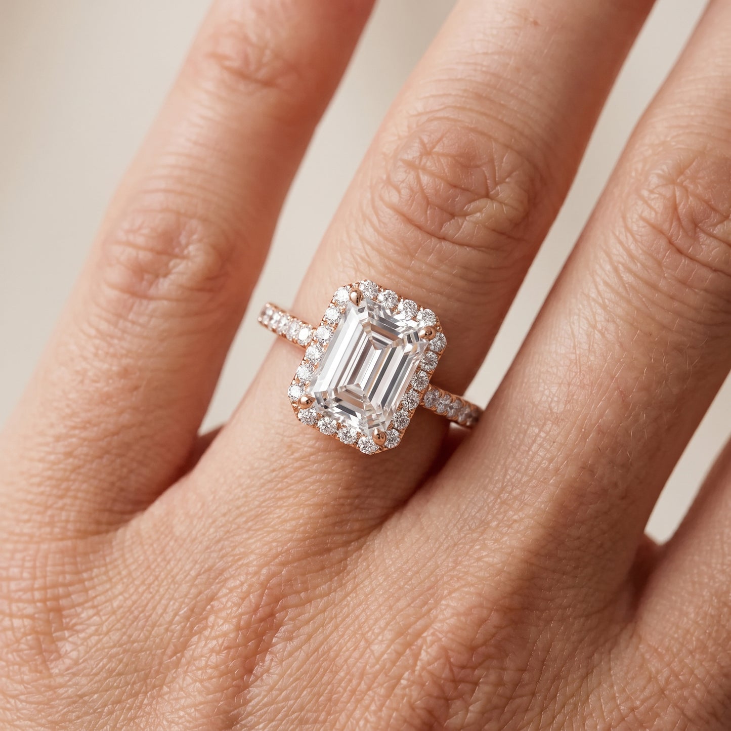 Alma Halo Pavé Emerald Diamond Ring in Rose Gold - lifestyle.jpg