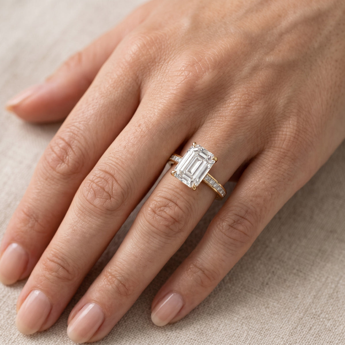 Freja Channel Set Emerald Diamond Engagement Ring in Silver - lifestyle.jpg
