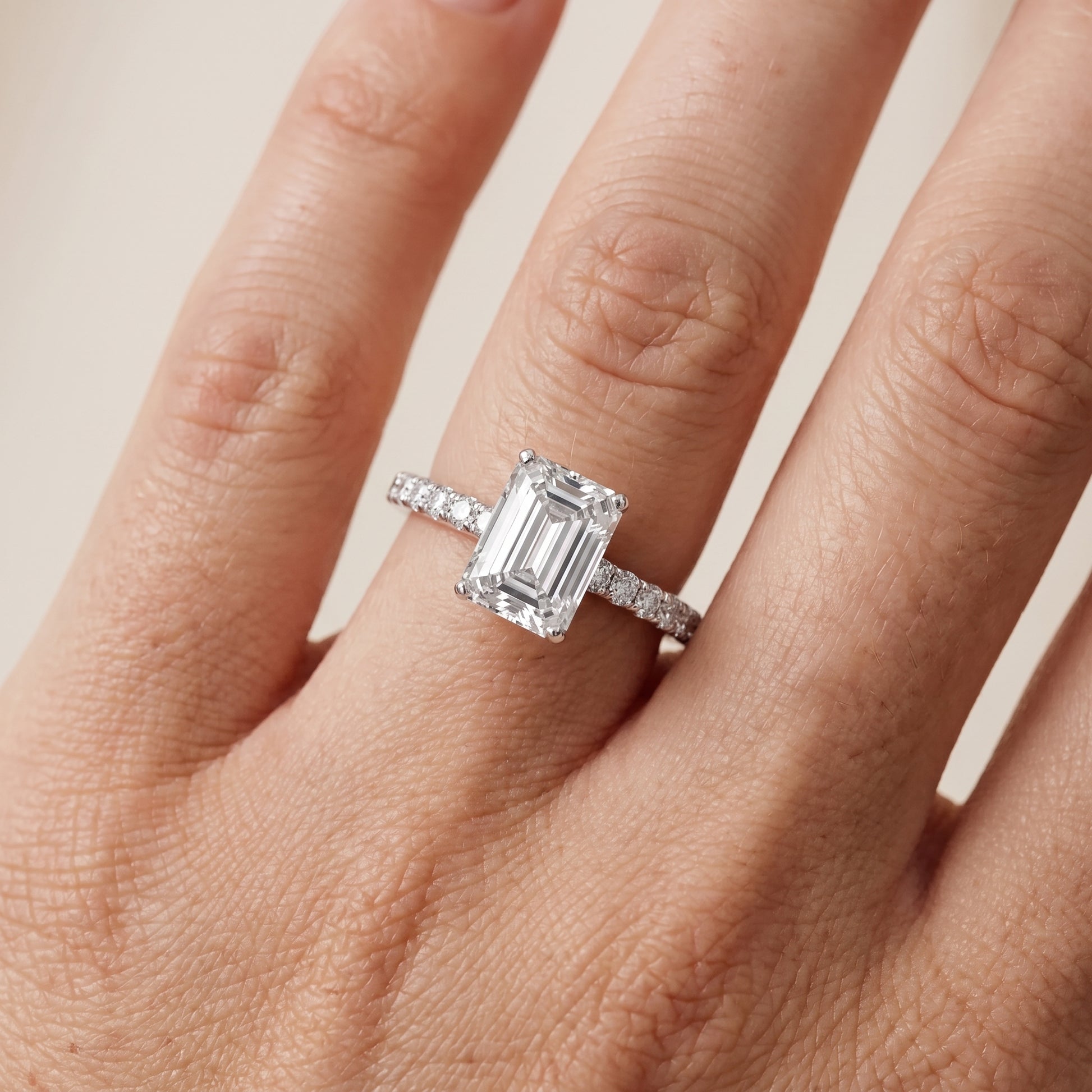 Juna French Pavé Solitaire Emerald Diamond Engagement Ring in White Gold - lifestyle.jpg