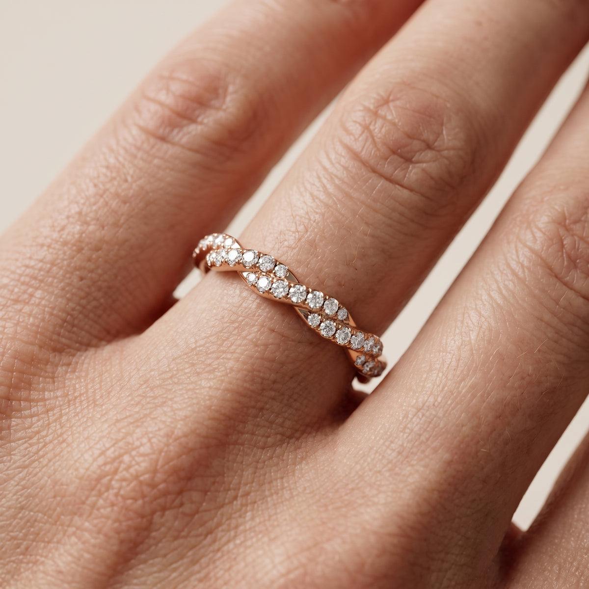 Everly Micropavé Twist Round Diamond Eternity Band in Rose Gold - lifestyle.jpg
