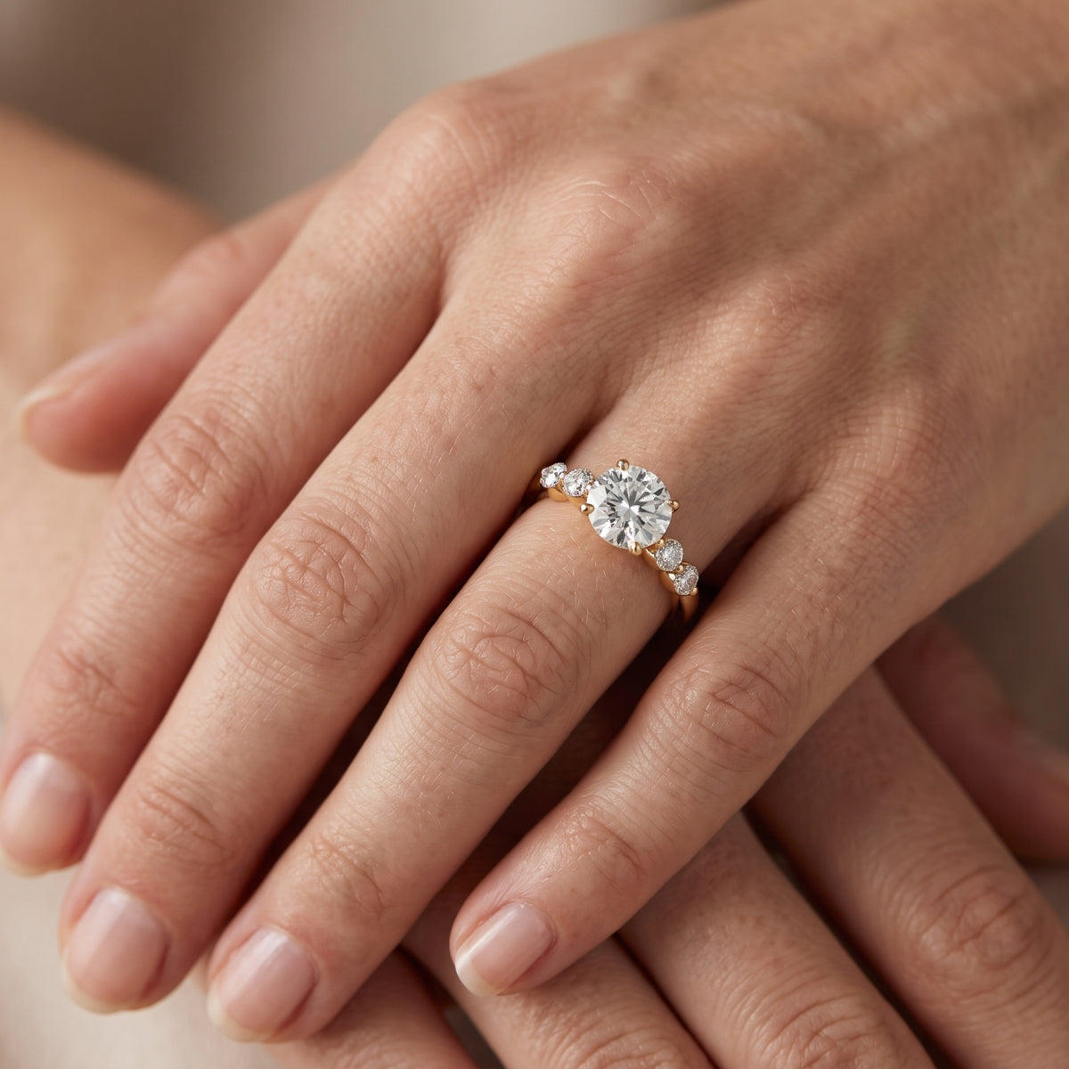 Vienna Floating Five-Stone Round Diamond Engagement Ring in Platinum - lifestyle.jpg