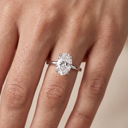 Nella Petite Solitaire Oval Diamond Engagement Ring in Platinum - lifestyle.jpg
